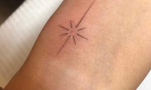 Fine Line Star Tattoo