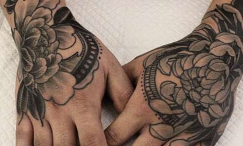 Flower Hand tattoo