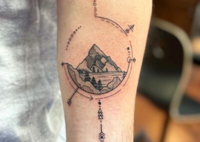 Delicate Geometric Mountain Tattoo