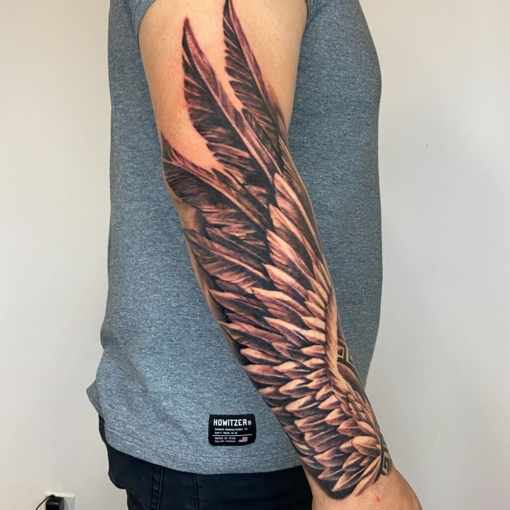 wings realism tattoos