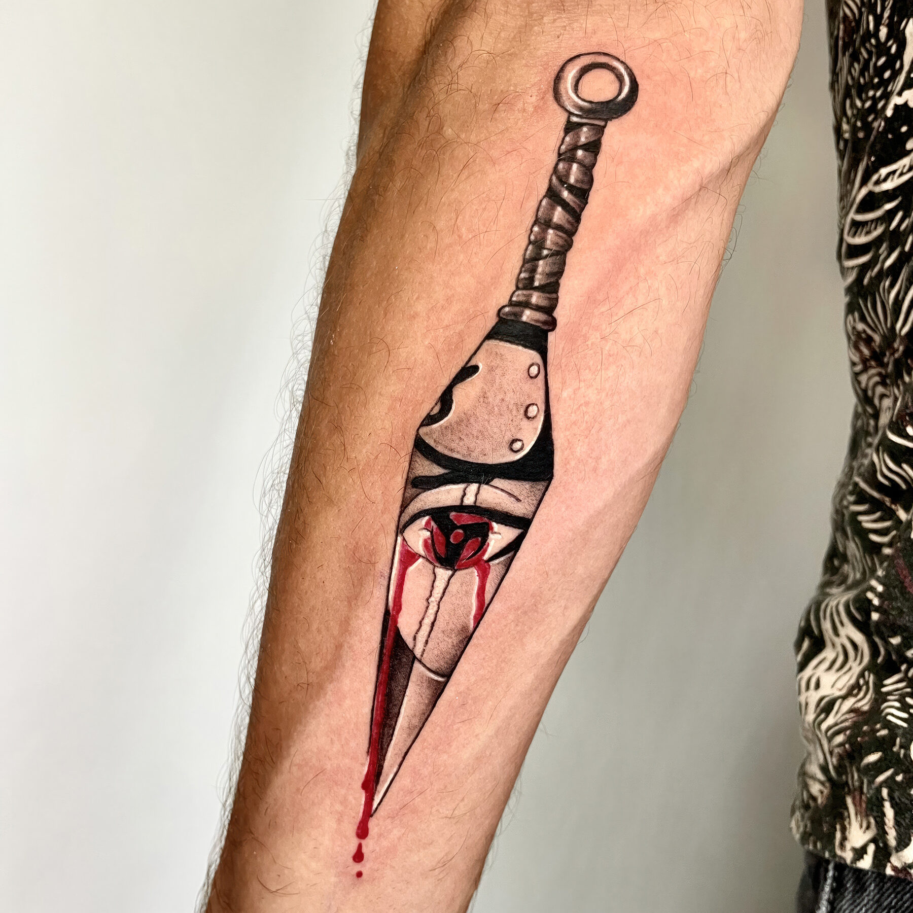 illustrative dagger tattoo los angeles
