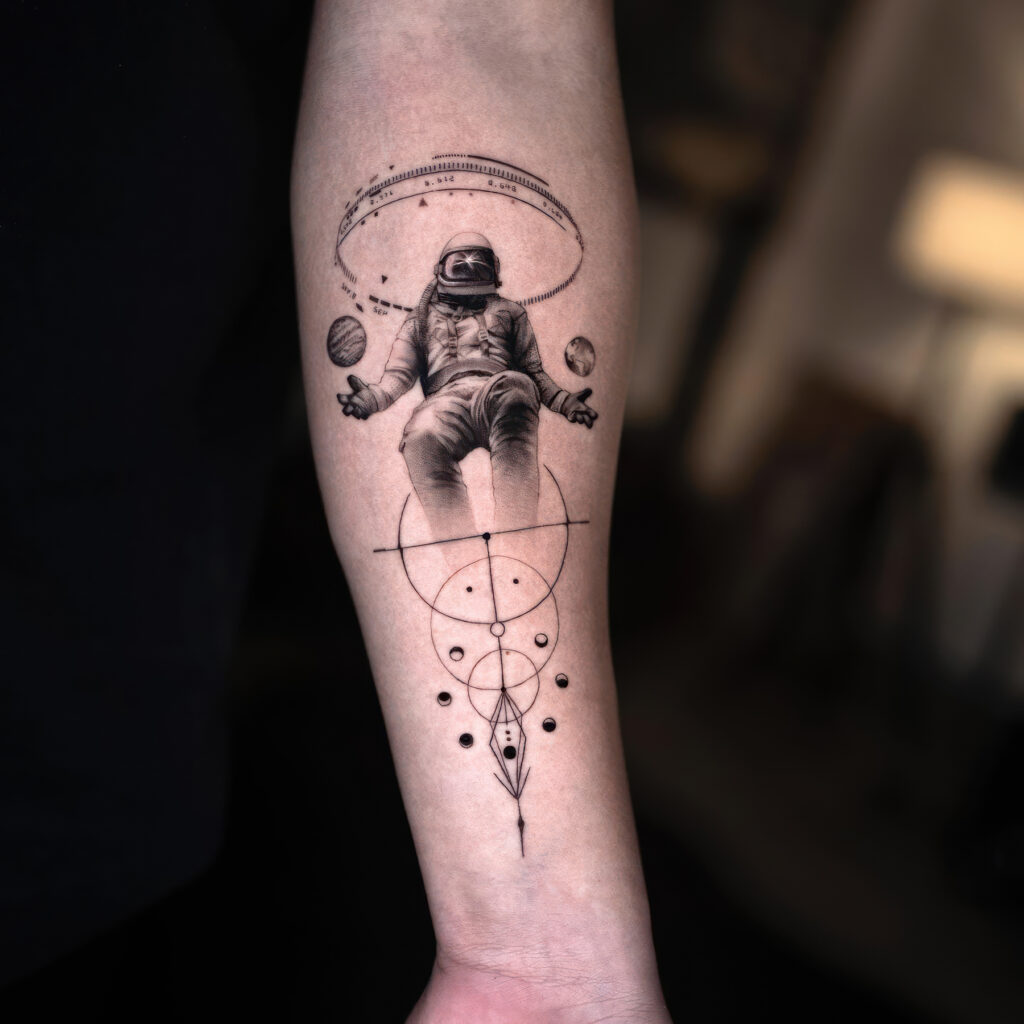 fine line astronaut tattoo
