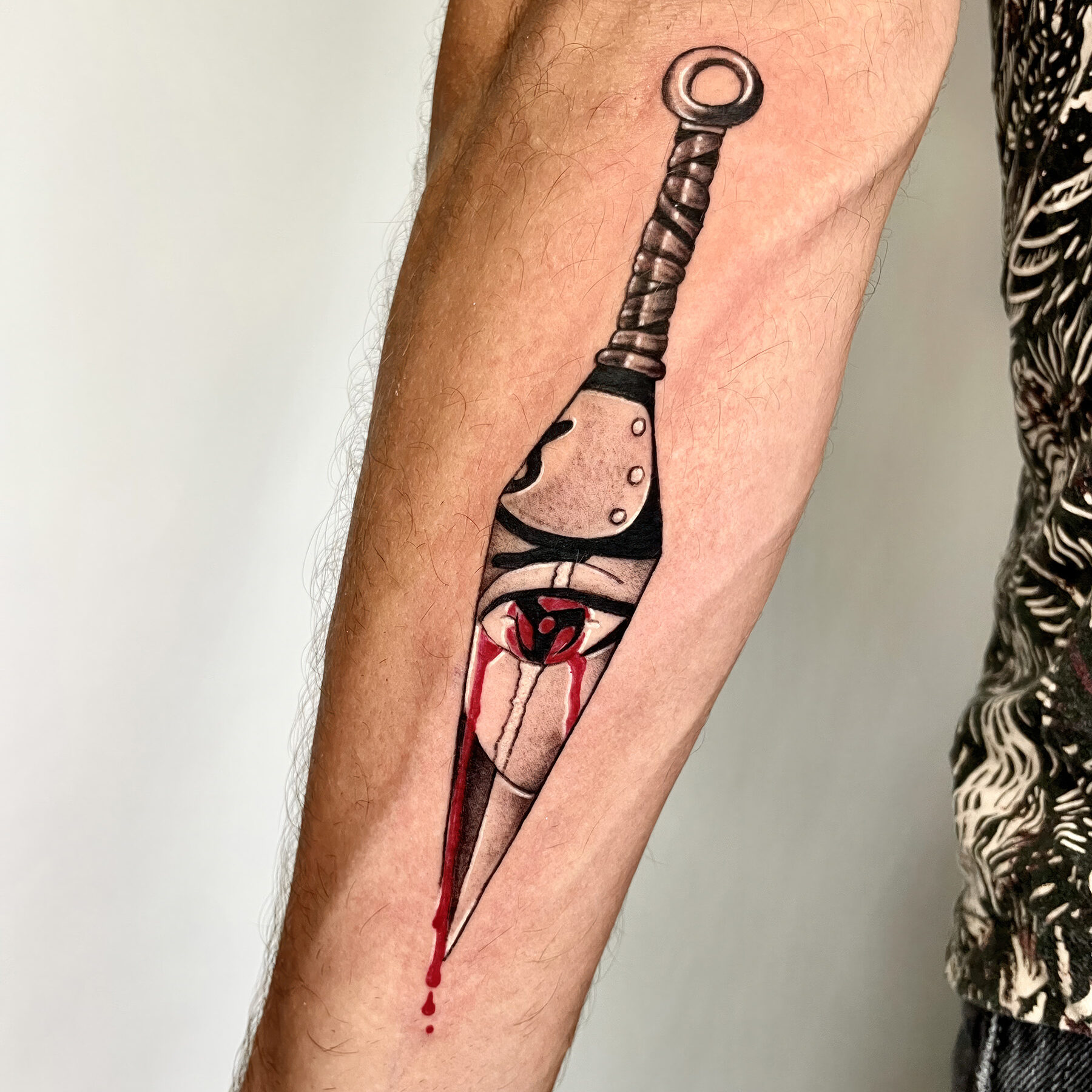 anime dagger tattoo